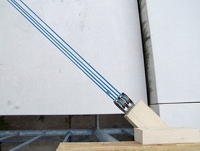 Pulley on framework cabled up to railing mount