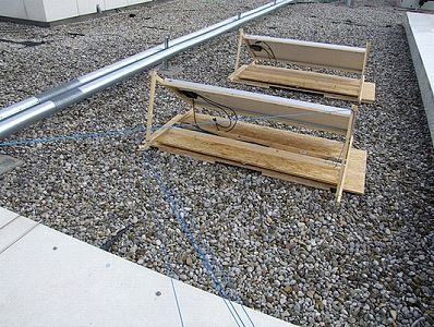 Cabling from wall/corner pulley block (left) and railing mount (right)