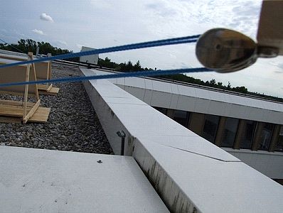 Cabling from right-side railing mount to far corner of nearest solar array