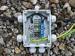 Open junction box with all cables installed