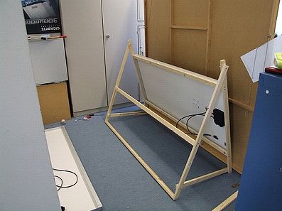 Solar panel framework with solar panel attached