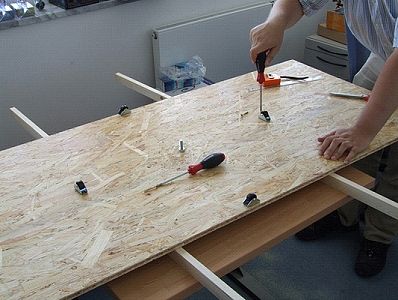 Mounting the rollers and central pivot/axle.
