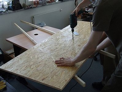 Drilling the pivot hole in the lower panel