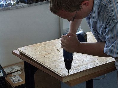 Reinforcing the lower panel with firring strips.