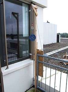 Mounting the pulley assembly on a nearby wall